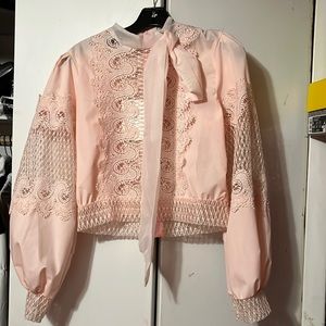 Petal pink New lace detail blouse. Long sleeve with bow detail on neck